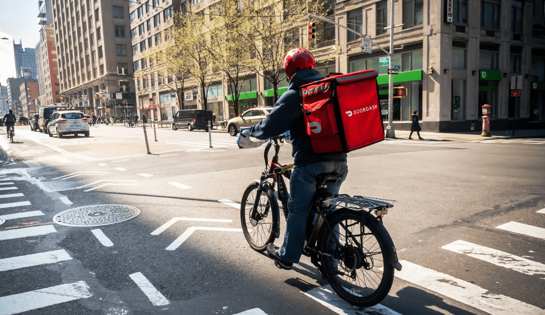 Cyclist delivering items